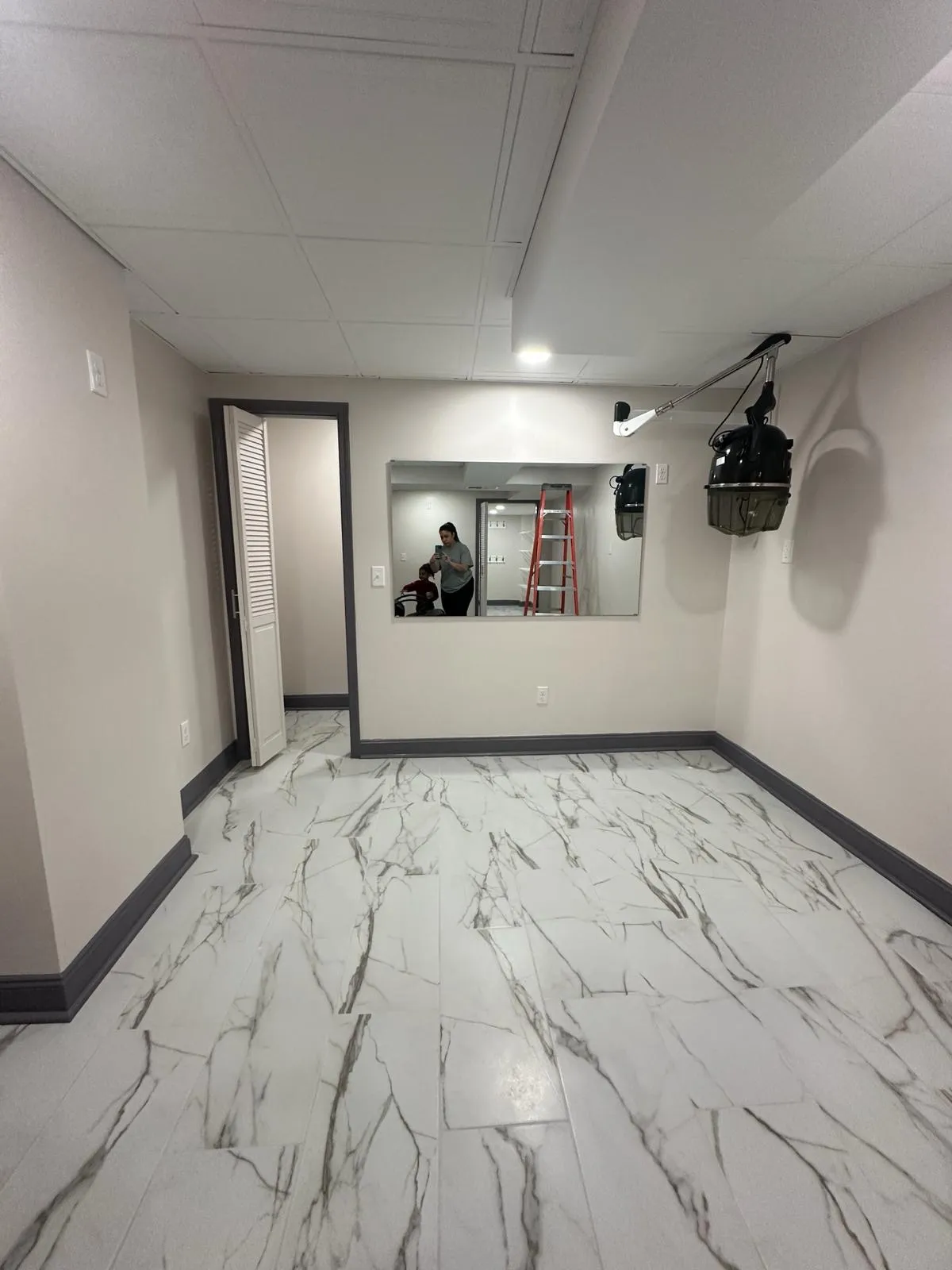 Finished basement with new electrical by TG Renovates