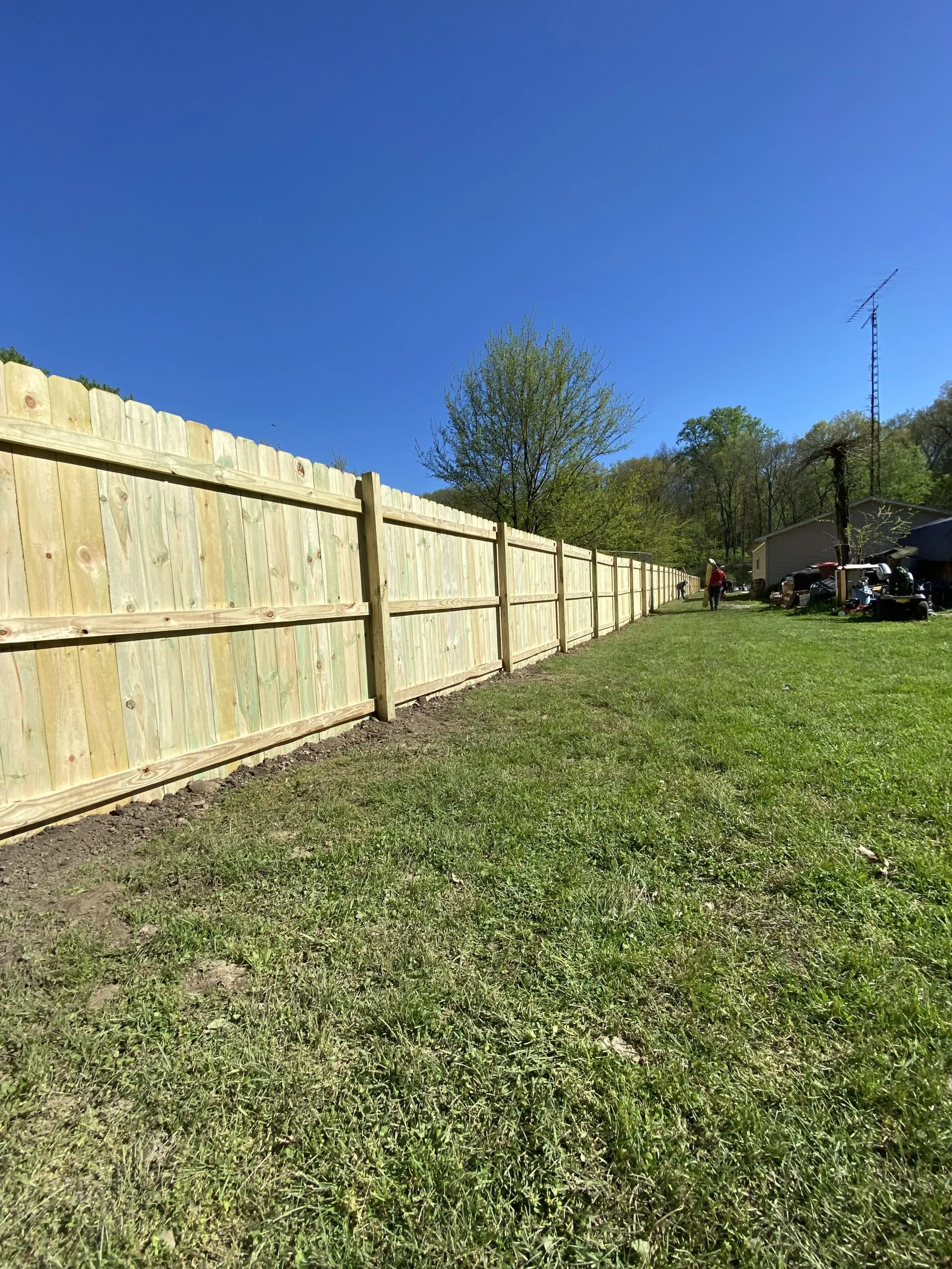 New cedar privacy fence installed by TG Renovates