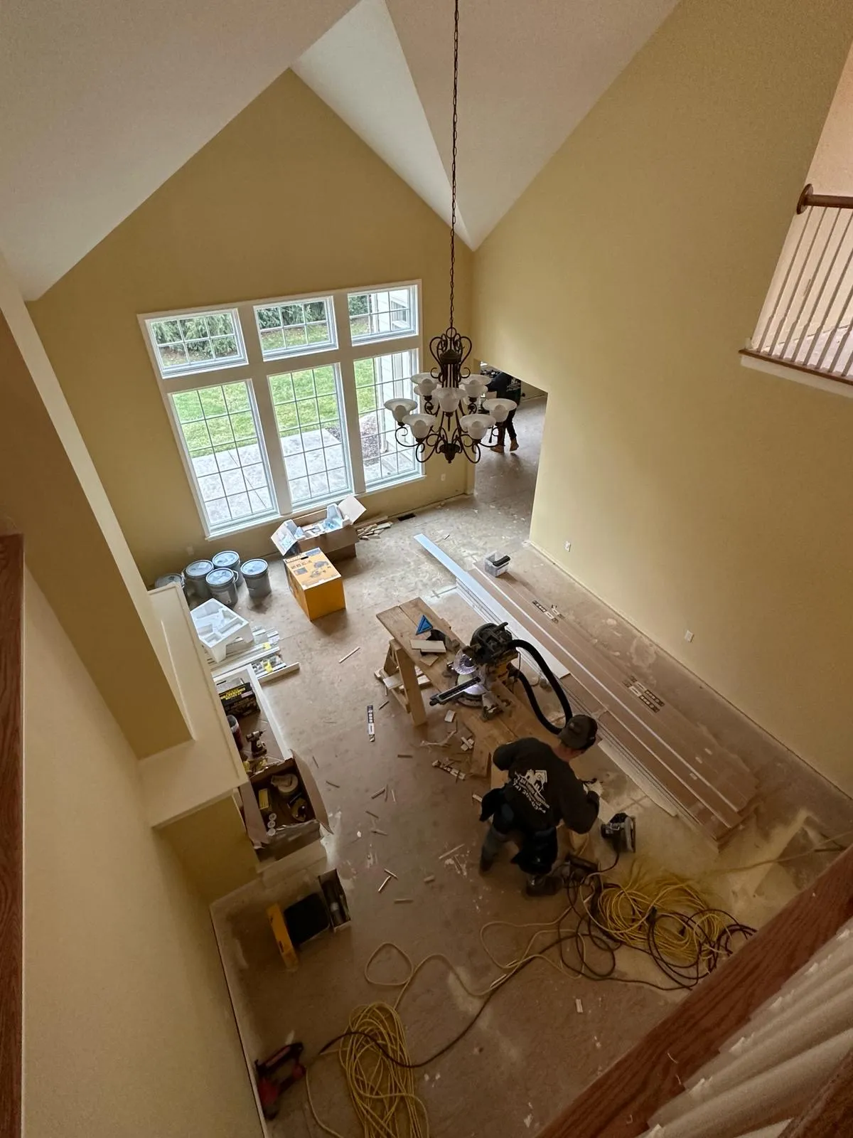 Vaulted great room mid-renovation by TG Renovates